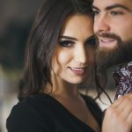 beautiful-woman-with-man-posing-camera